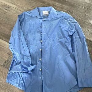Long sleeve button up blue shirt